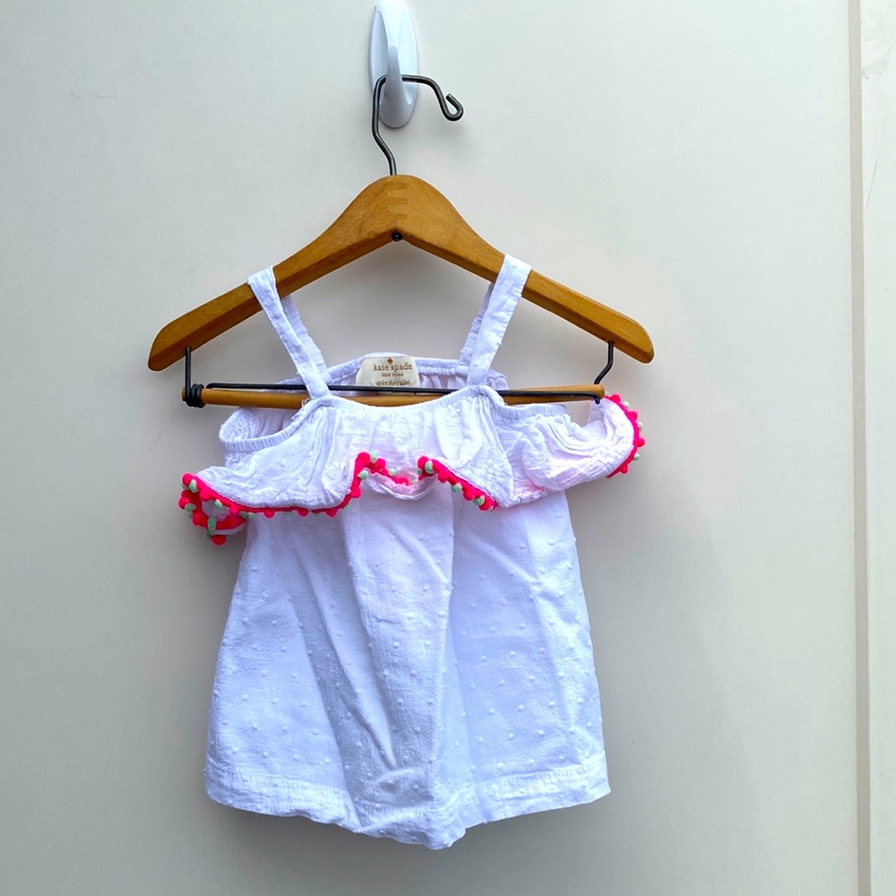 Kate Spade infant top. Size 18 months. Good used condition. Small stain as shown